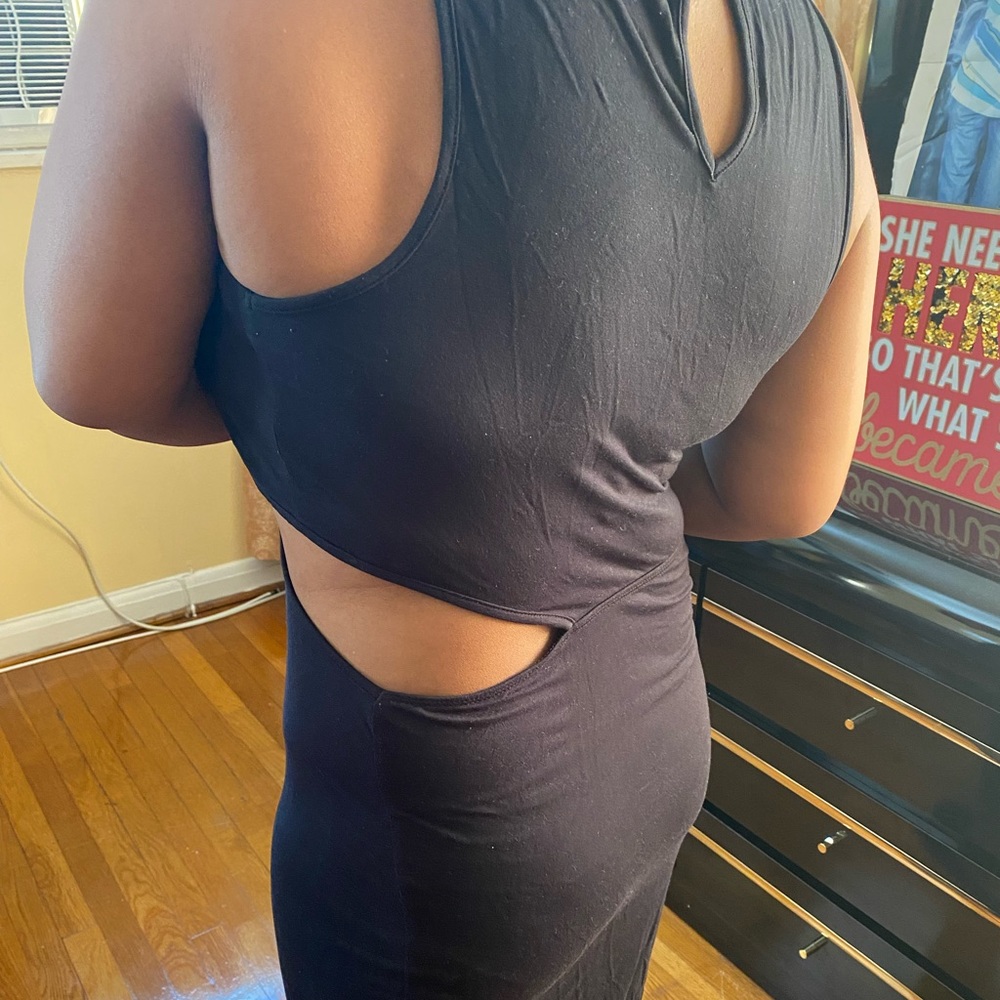 Not just your ordinary black dress. You can wear this anywhere. Medium dress.